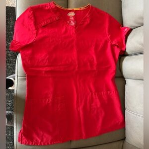 Red Dickies scrub top and bottoms. Used.